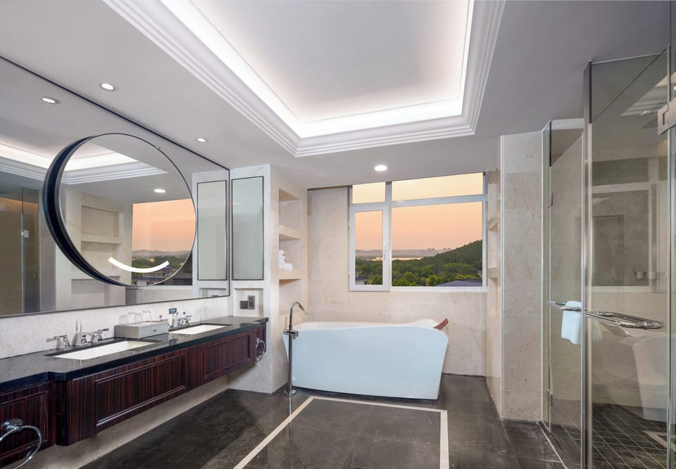 One Bedroom Suite Study | Bathroom | Free toiletries, hair dryer, bathrobes, slippers