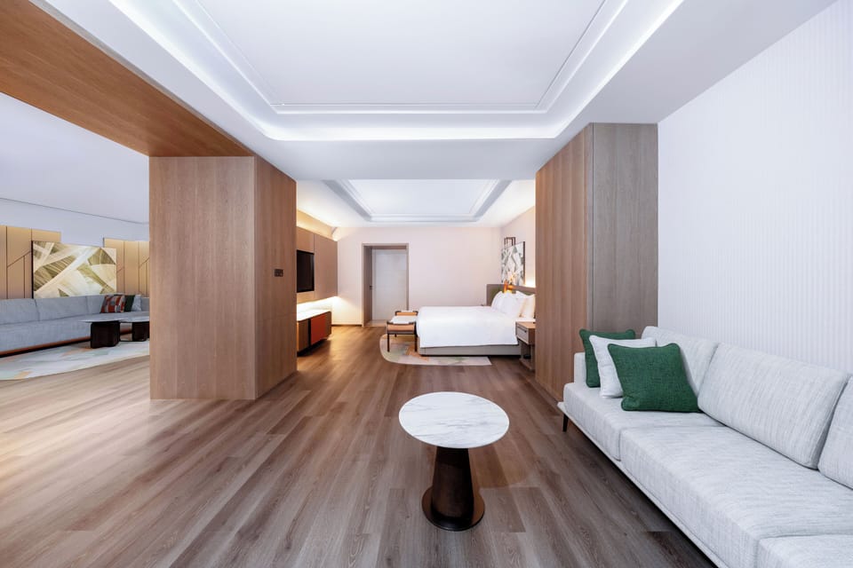 One Bedroom Suite Entertainment | Down comforters, in-room safe, blackout drapes, cribs (free)