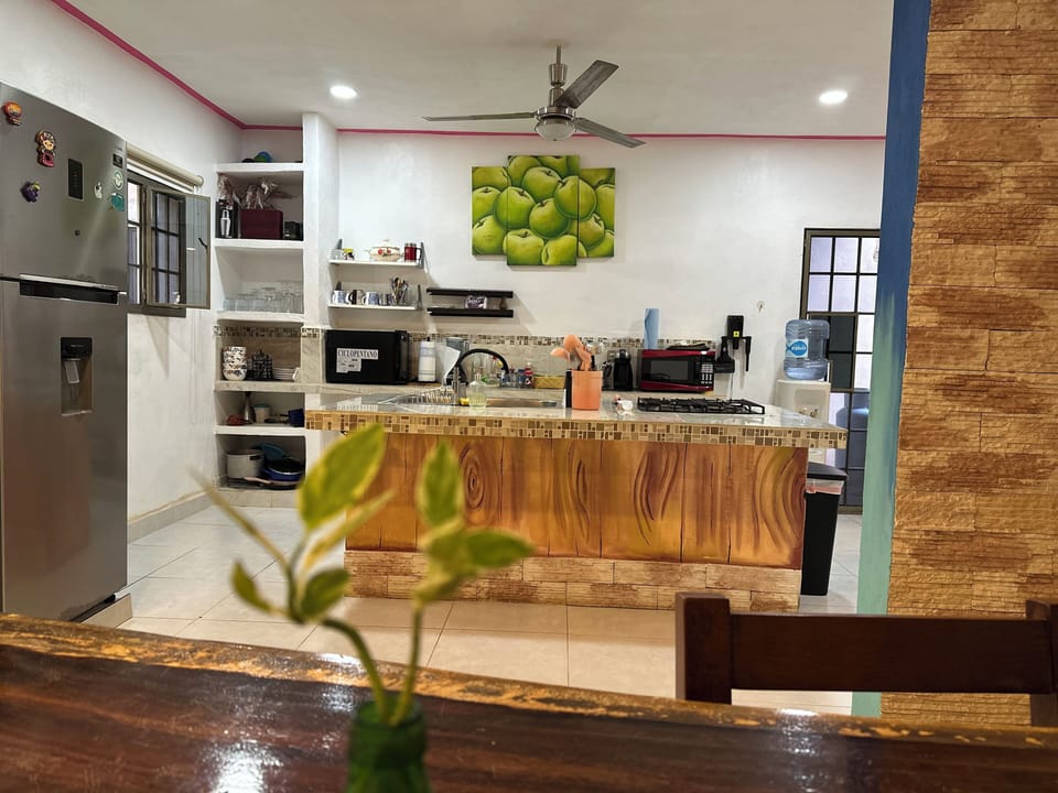 Family House, Garden View | Private kitchen | Coffee/tea maker, full-size fridge, microwave, stovetop