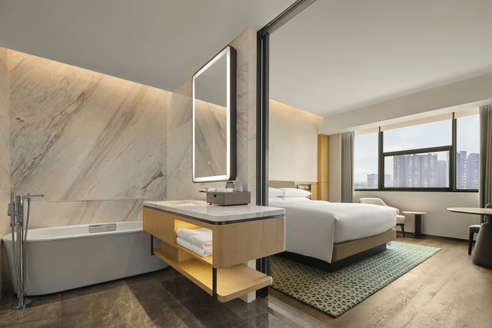 Junior Suite, 1 King Bed, Garden View | Soundproofing, rollaway beds, bed sheets