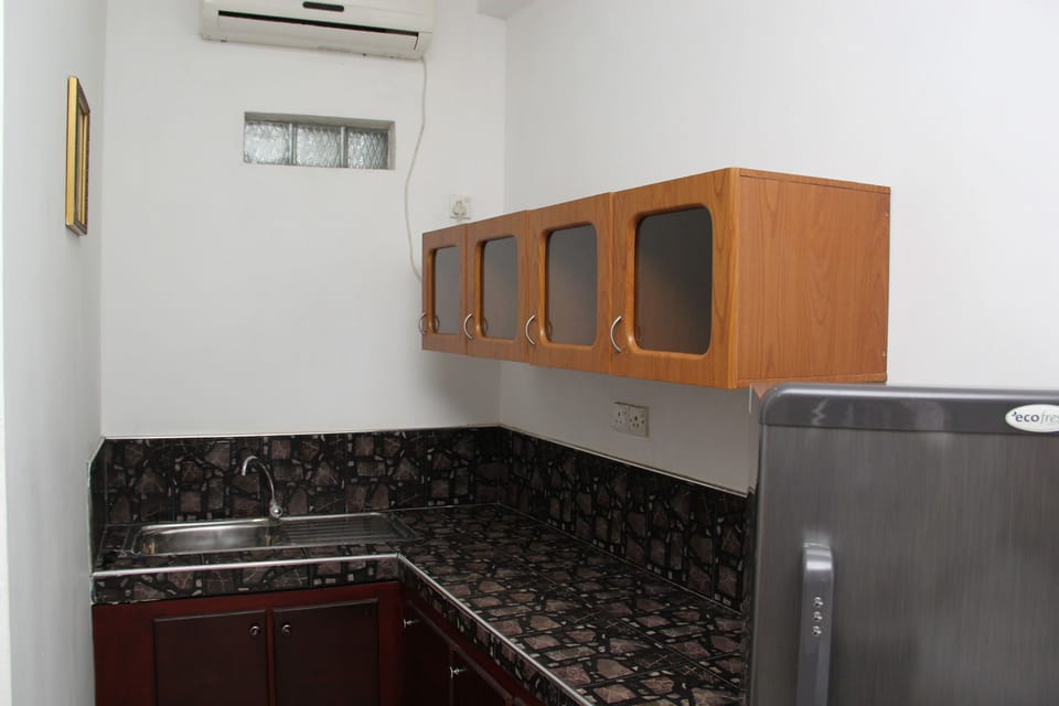Deluxe Room (with  AC) | Minibar, in-room safe, desk, soundproofing