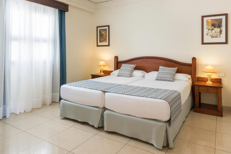 Blackout drapes, WiFi (free), bed sheets