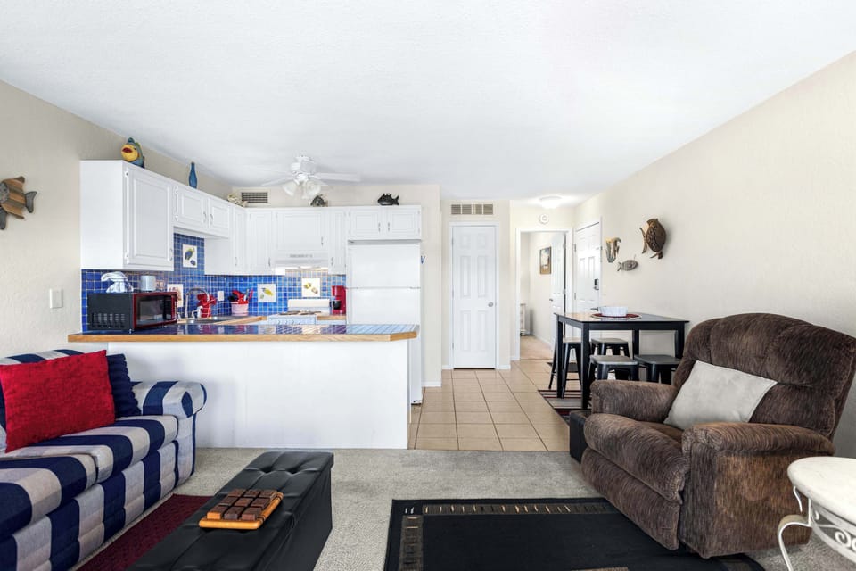 Condo, 1 King Bed with Sofa bed, Balcony (The Nook at Weston Point) | Living area | 41-inch flat-screen TV with digital channels