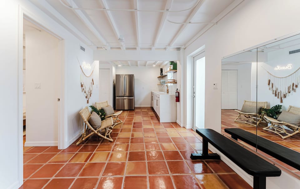 Deluxe House, Multiple Bedrooms, Garden View | Living area | 55-inch Smart TV with cable channels, Netflix, Hulu