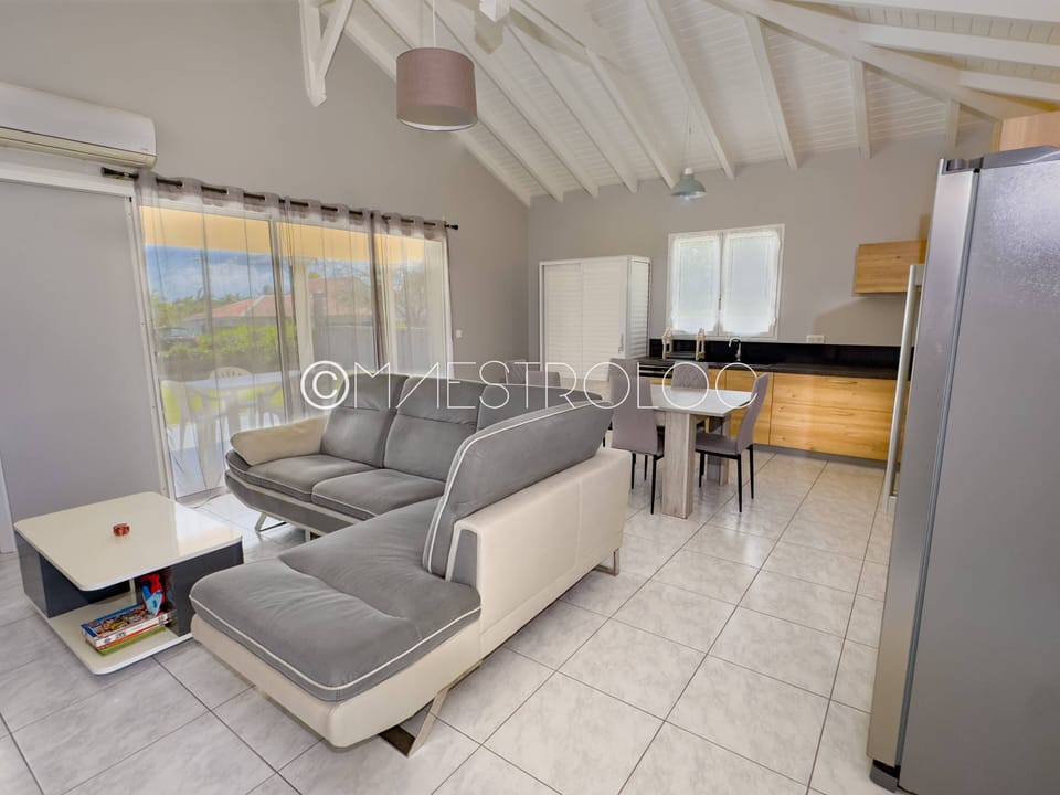 Comfort House, Balcony, Garden View | Living area