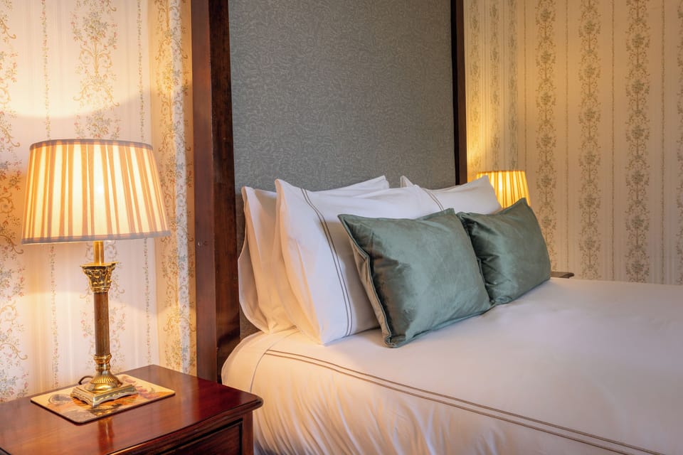 Deluxe Double Room, Garden View | Desk, laptop workspace, blackout drapes, iron/ironing board