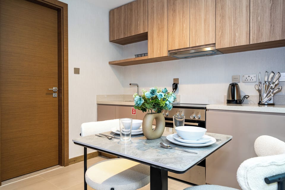Apartment, Balcony, Lake View | In-room dining