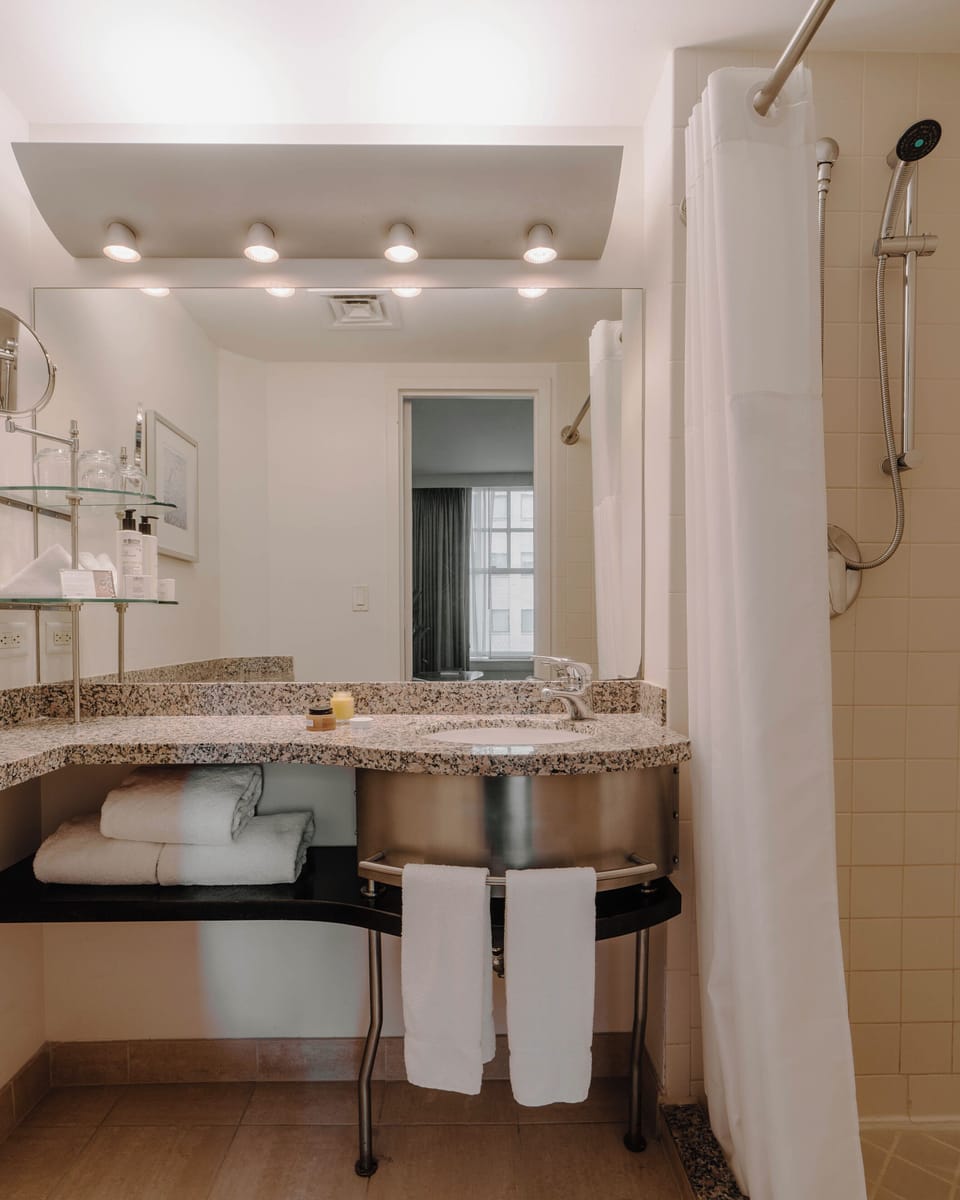 Hair dryer, towels, soap, shampoo