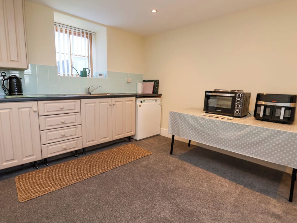 Fridge, microwave, toaster, cookware/dishes/utensils