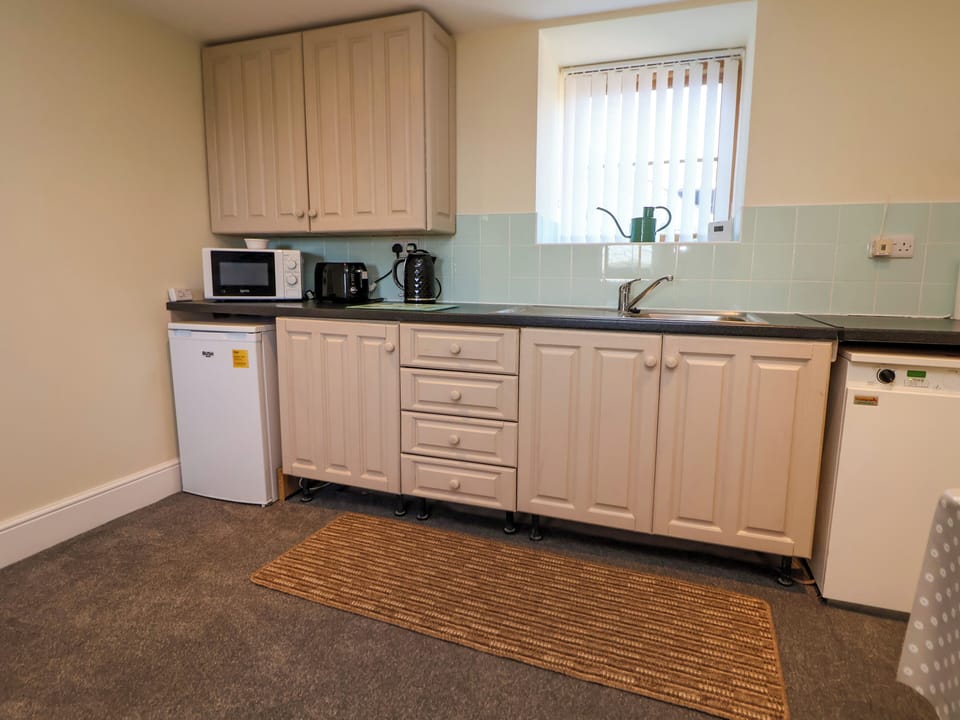 Fridge, microwave, toaster, cookware/dishes/utensils