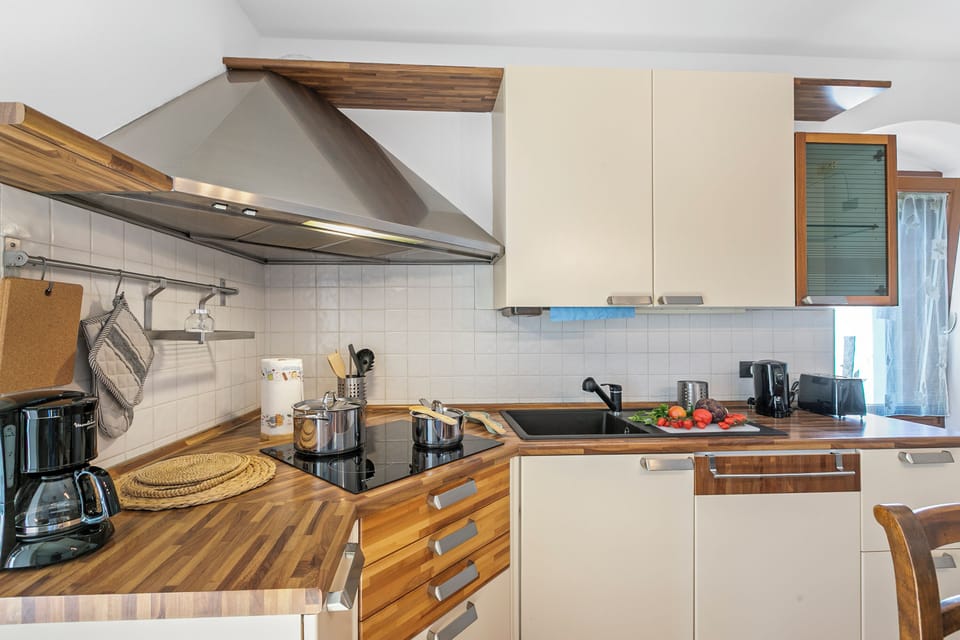 Standard Apartment, Multiple Bedrooms (Residenza I 3 Mori A) | Private kitchen | Fridge, microwave, stovetop, coffee/tea maker