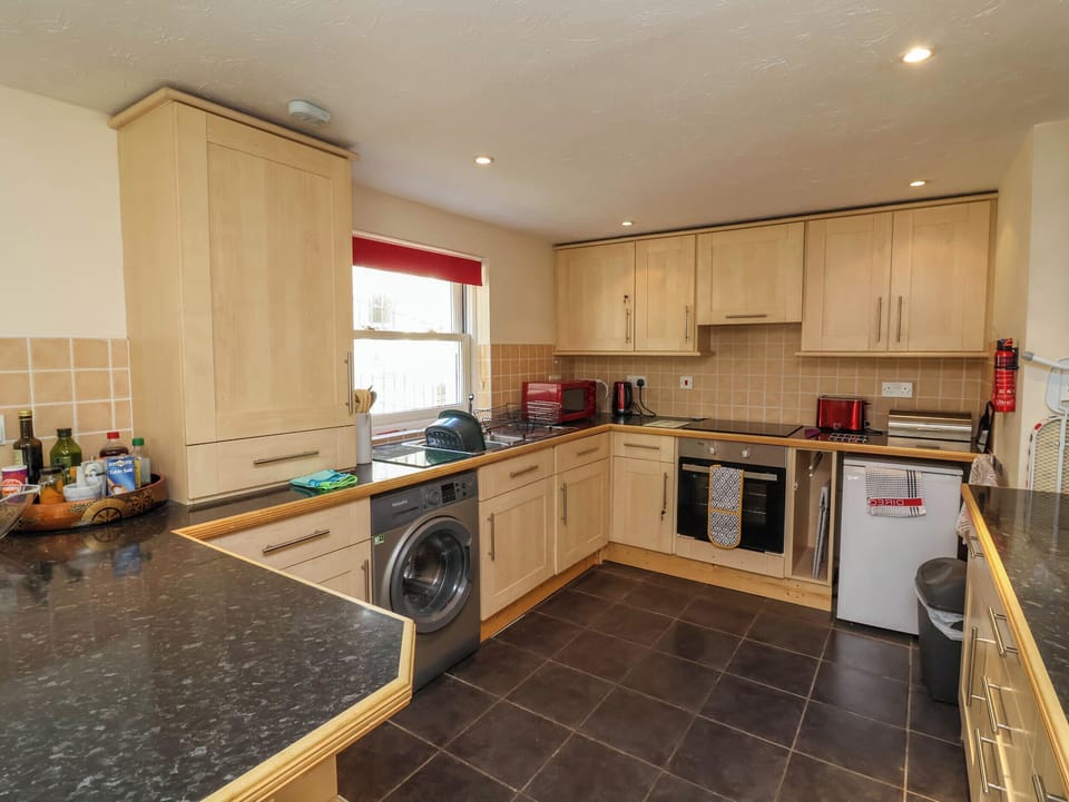 Fridge, microwave, toaster, cookware/dishes/utensils