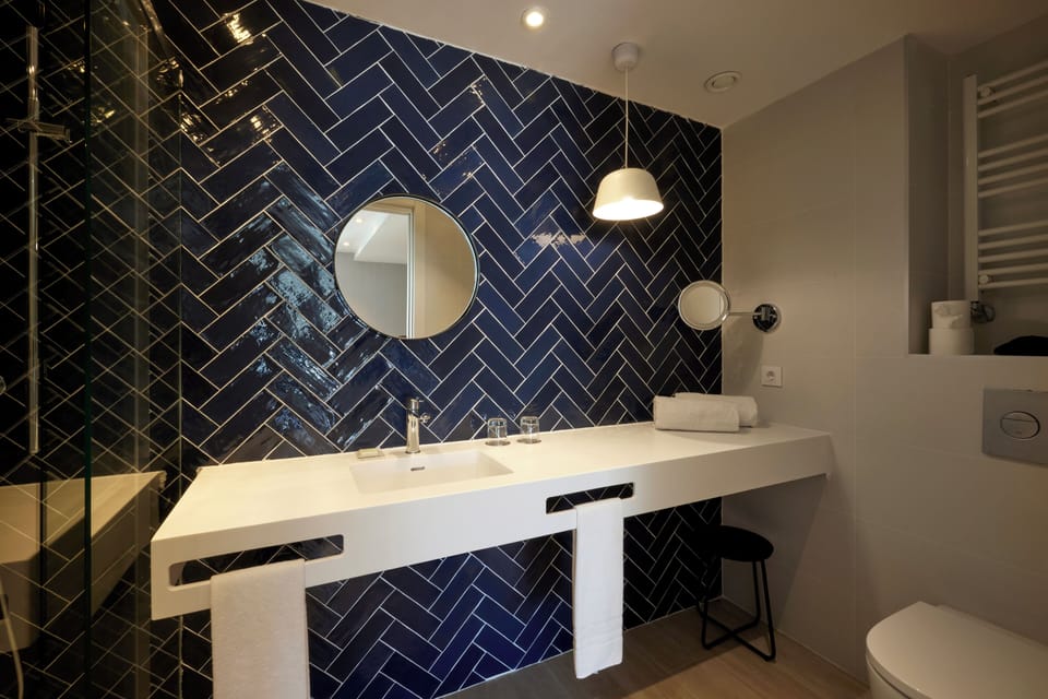 Bathtub, deep soaking tub, eco-friendly toiletries, hair dryer