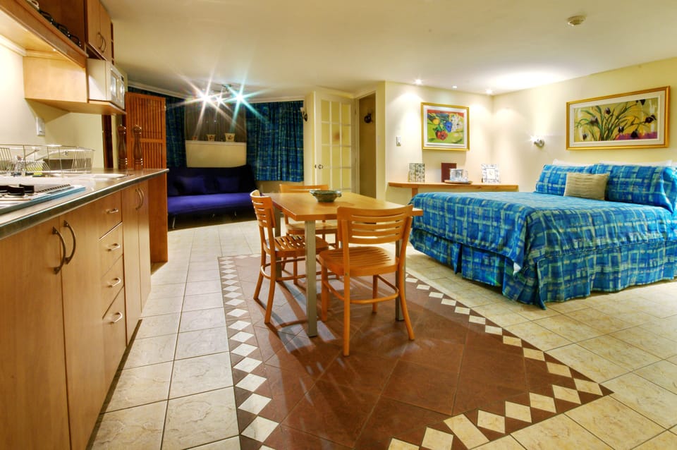 Standard Studio, 1 Bedroom, Refrigerator & Microwave (half-basement) | Premium bedding, individually decorated, soundproofing
