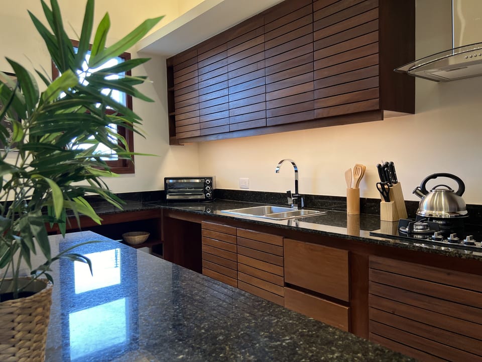 Superior Suite, 2 Bedrooms, Kitchen, Pool View | Private kitchen