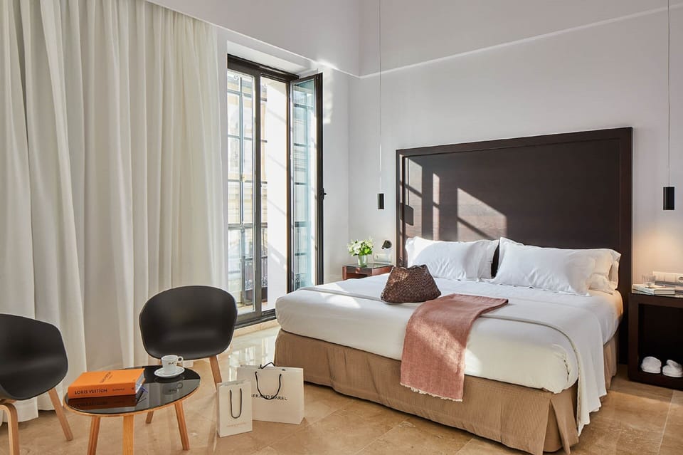 Hypo-allergenic bedding, down comforters, free minibar items