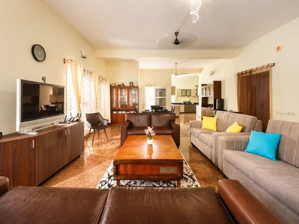 Villa (1 Bedroom) | Living area | 66-inch TV with digital channels