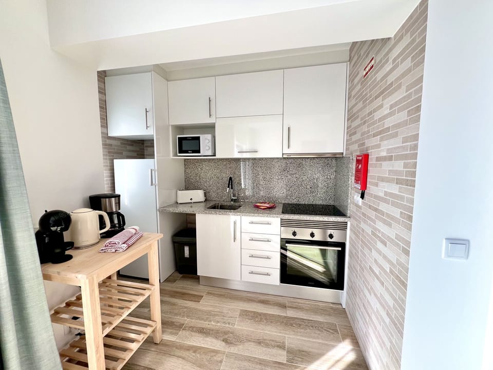 Microwave, oven, coffee/tea maker, toaster