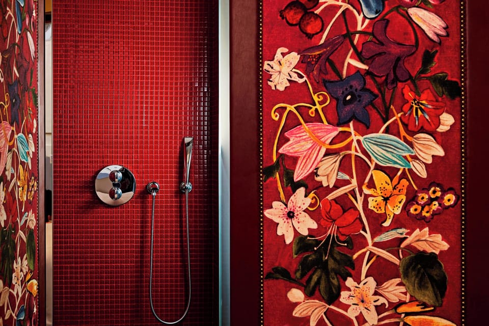 Designer toiletries, hair dryer, bathrobes, slippers