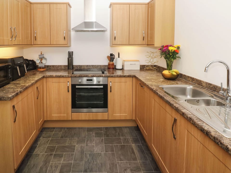 Fridge, microwave, toaster, cookware/dishes/utensils