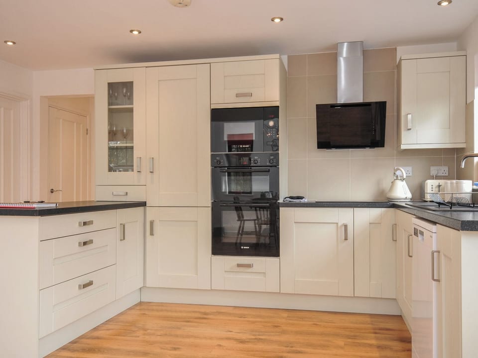 Fridge, microwave, dishwasher, cookware/dishes/utensils