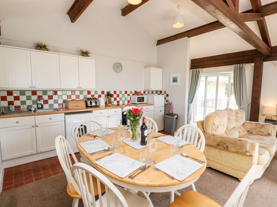 Fridge, microwave, toaster, cookware/dishes/utensils