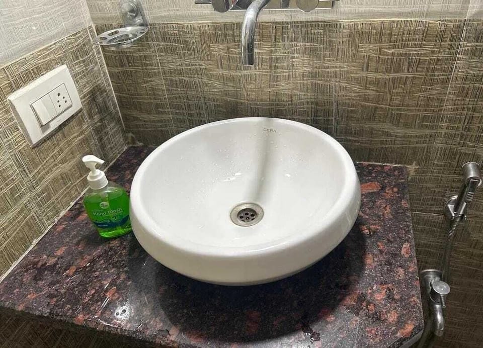 Economy Double Room, Balcony, City View | Bathroom | Shower, free toiletries, soap, shampoo