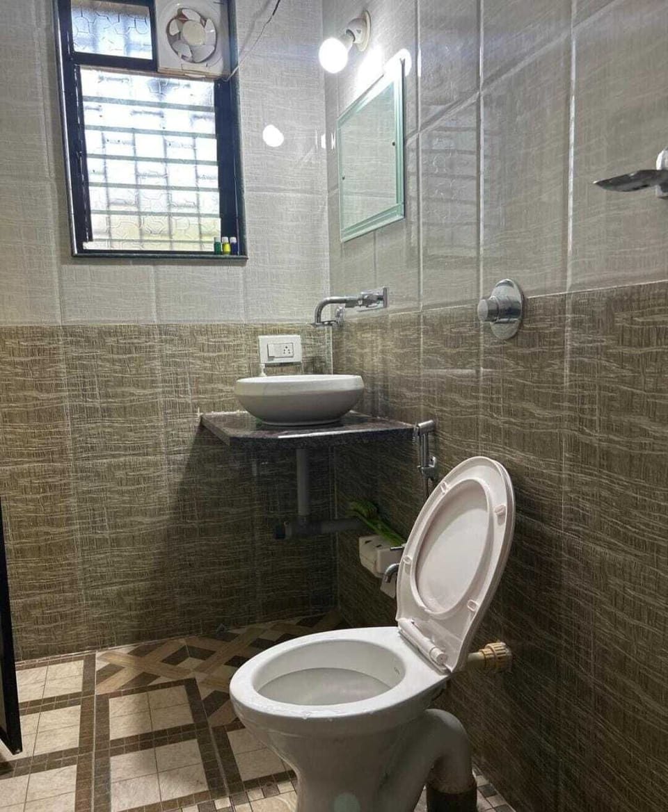 Economy Double Room, Balcony, City View | Bathroom | Shower, free toiletries, soap, shampoo