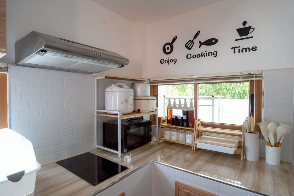 Deluxe Villa, 3 Bedrooms, Pool View | Shared kitchen | Microwave, rice cooker