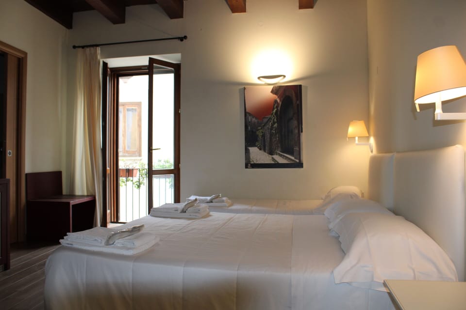 Comfort Triple Room, Non Smoking | In-room safe, desk, laptop workspace, blackout drapes