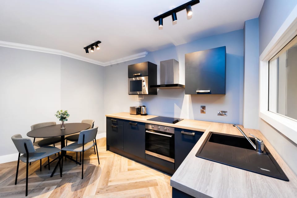 1 Bedroom Apartment | Private kitchen | Fridge, microwave, stovetop, dishwasher