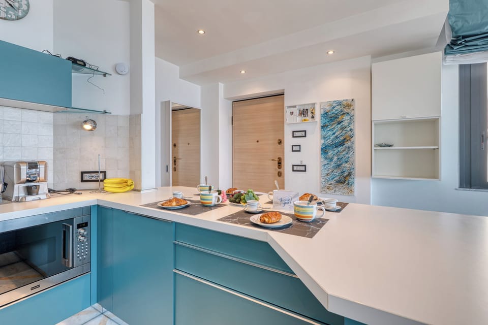 Family Apartment, Multiple Bedrooms, 2 Bathrooms, Sea Facing (Front Beach Magic Sea - Sea Front) | Private kitchen | Fridge, microwave, stovetop, dishwasher