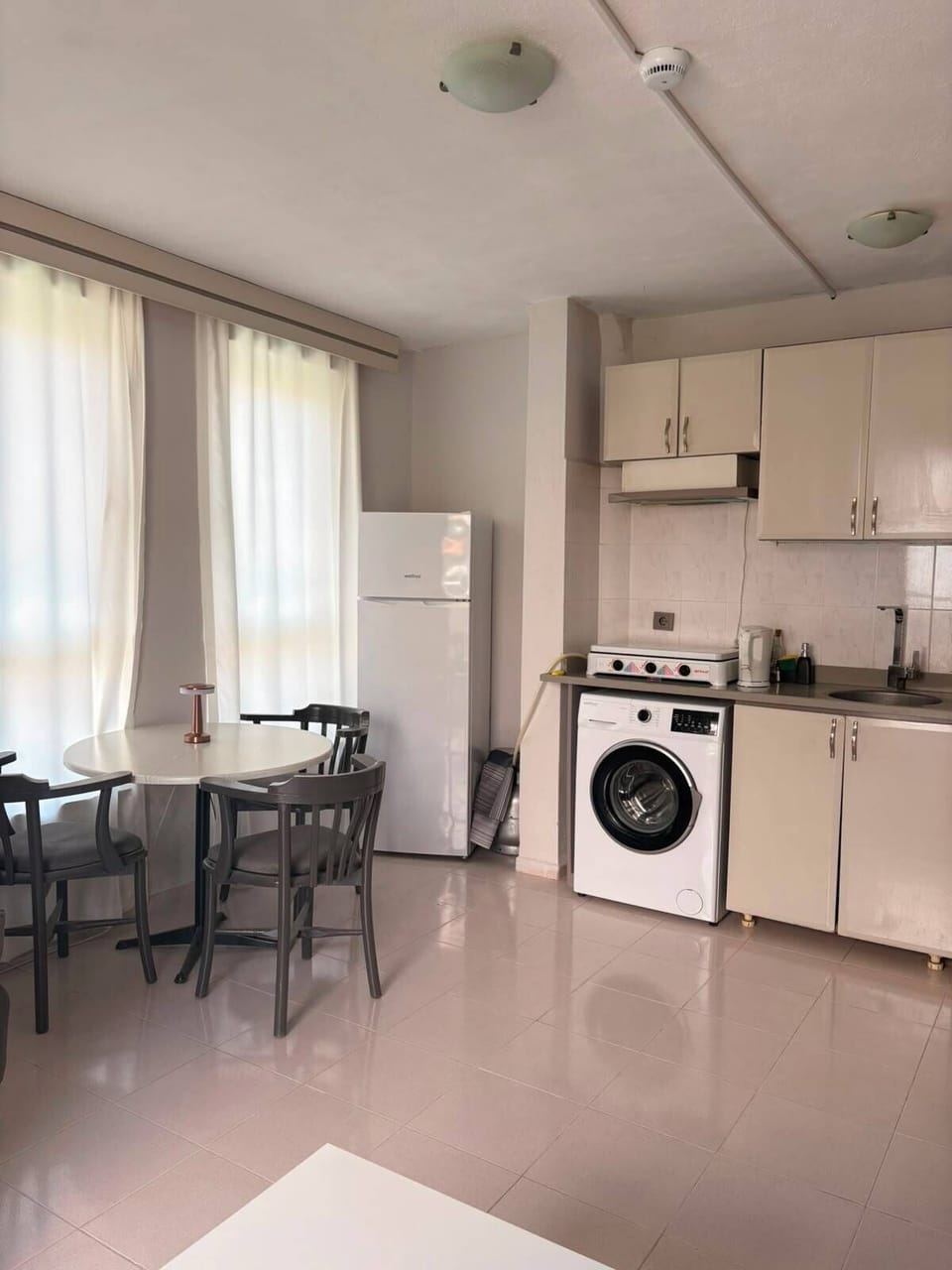 Apartment, Balcony | Private kitchen | Fridge