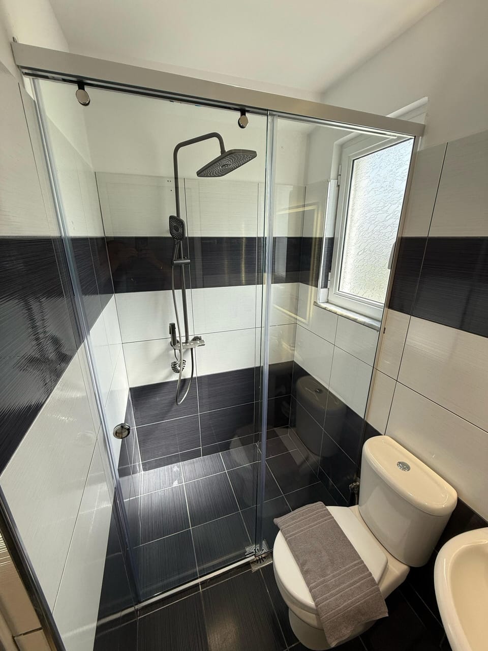Shower, free toiletries, hair dryer, towels