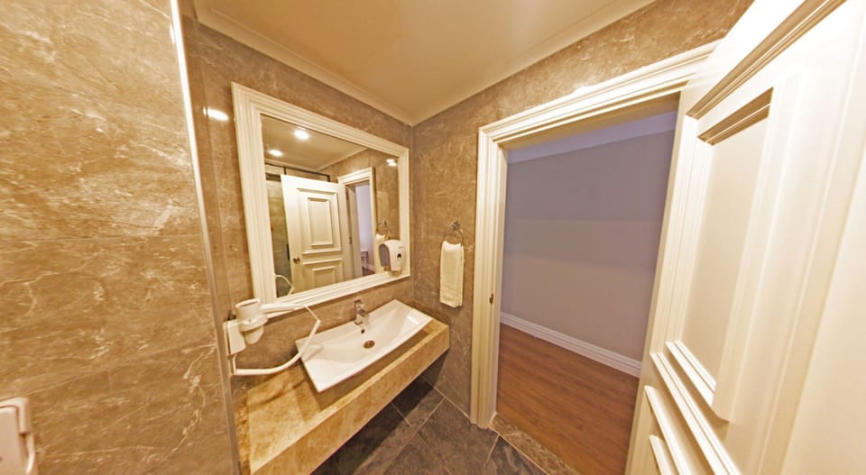 Shower, hair dryer, slippers, soap