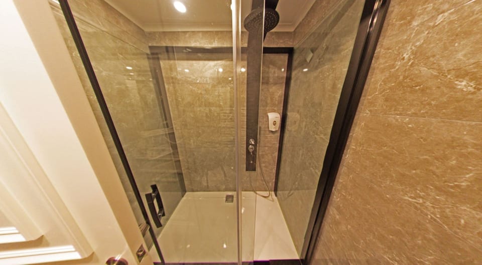 Shower, hair dryer, slippers, soap