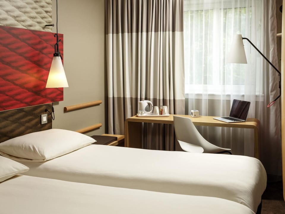 Memory foam beds, desk, laptop workspace, blackout drapes