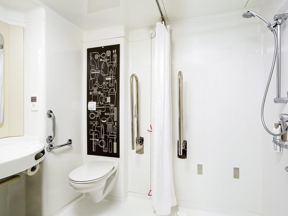 Shower, eco-friendly toiletries, hair dryer, towels