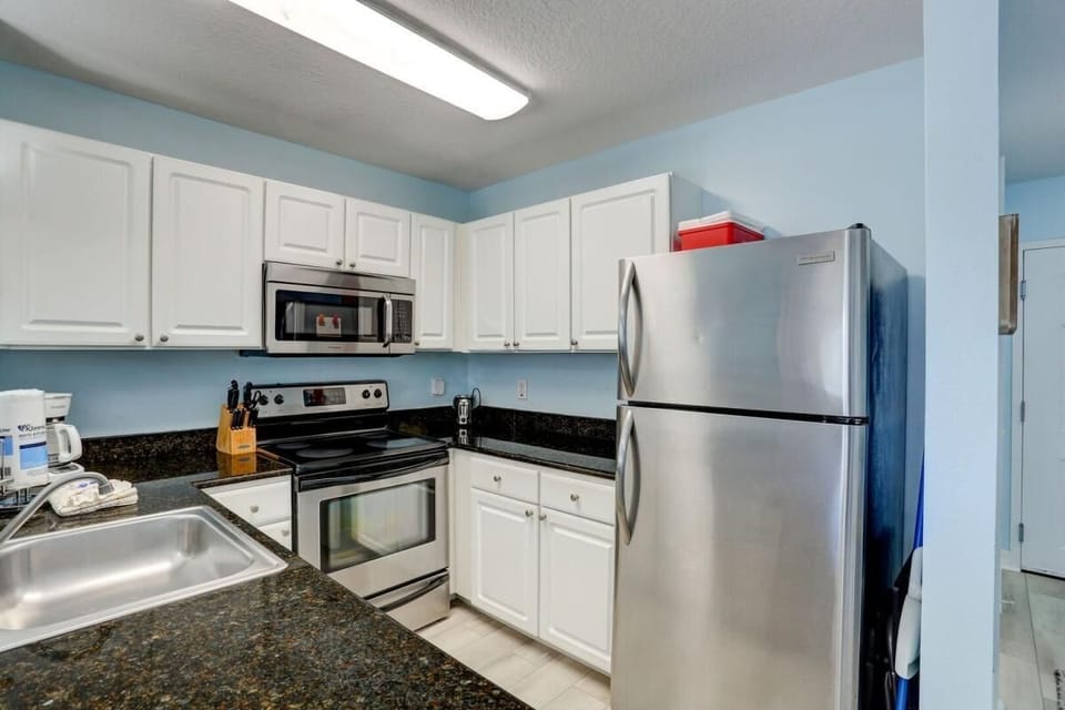 Condo, 1 King Bed with Sofa bed (Madeira Bay Resort II - 309) | Private kitchen | Oven, toaster
