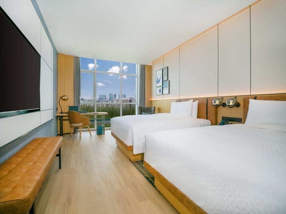 Premium Room, 2 Double Beds, City View | Down comforters, minibar, in-room safe, blackout drapes