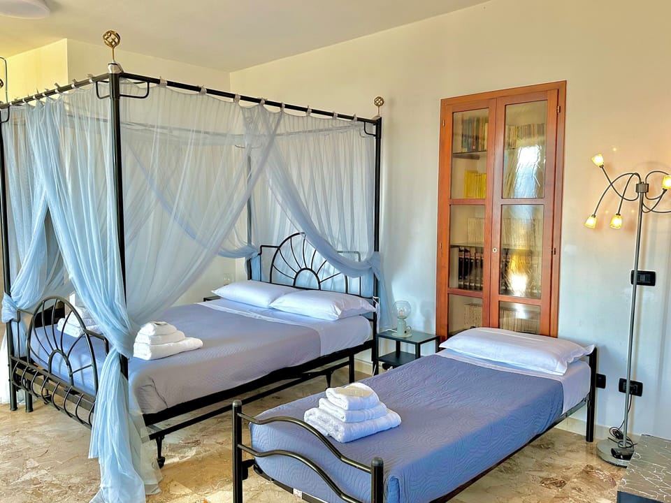 Deluxe Triple Room, Balcony, Sea View | Individually decorated, individually furnished, desk, soundproofing