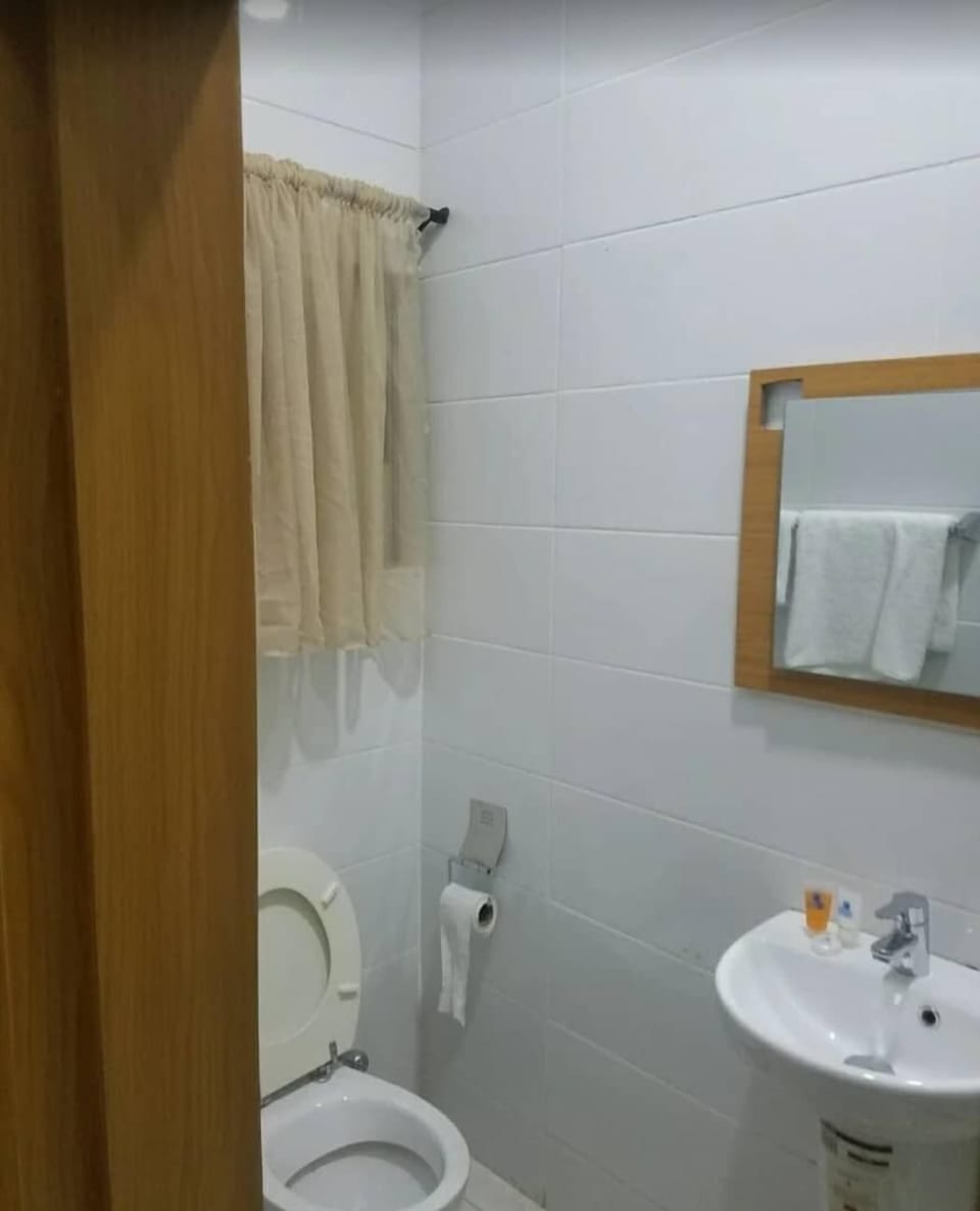 Apartment, 2 Bedrooms | Bathroom | Separate tub and shower, soap, toilet paper