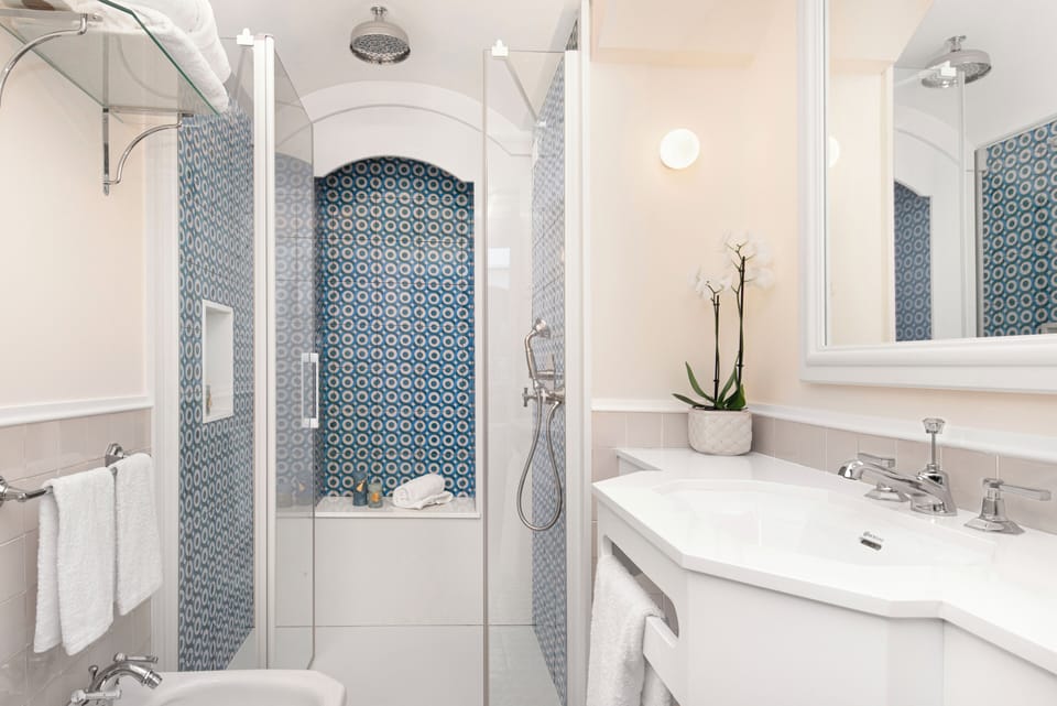 Standard Double Room | Bathroom | Shower, hair dryer, slippers, towels