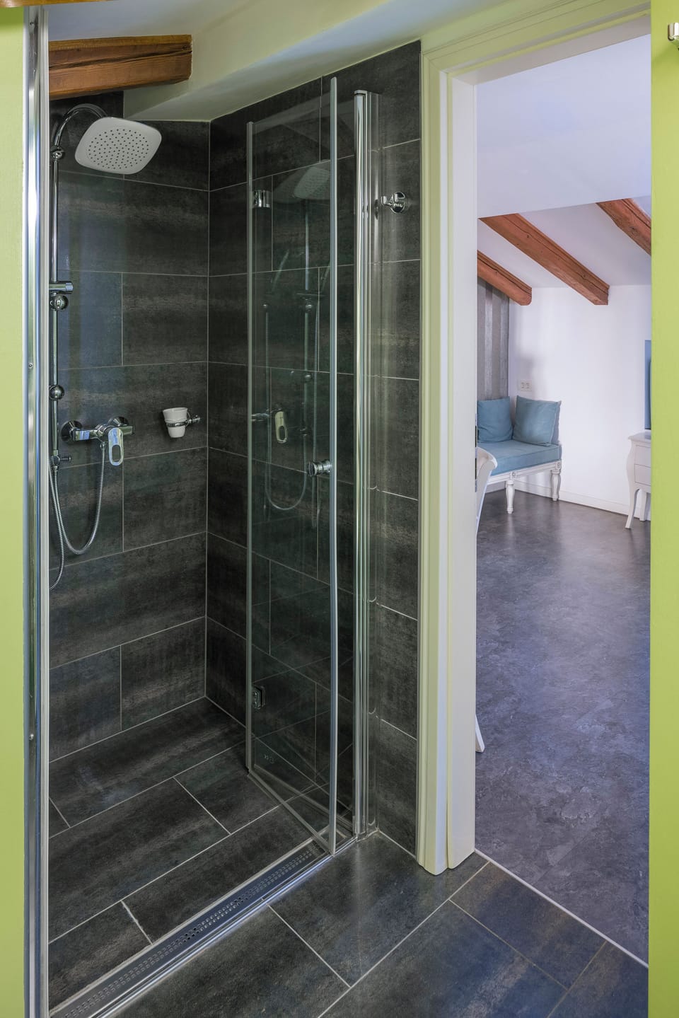 Deluxe Loft, City View | Bathroom | Shower, hair dryer, slippers, towels