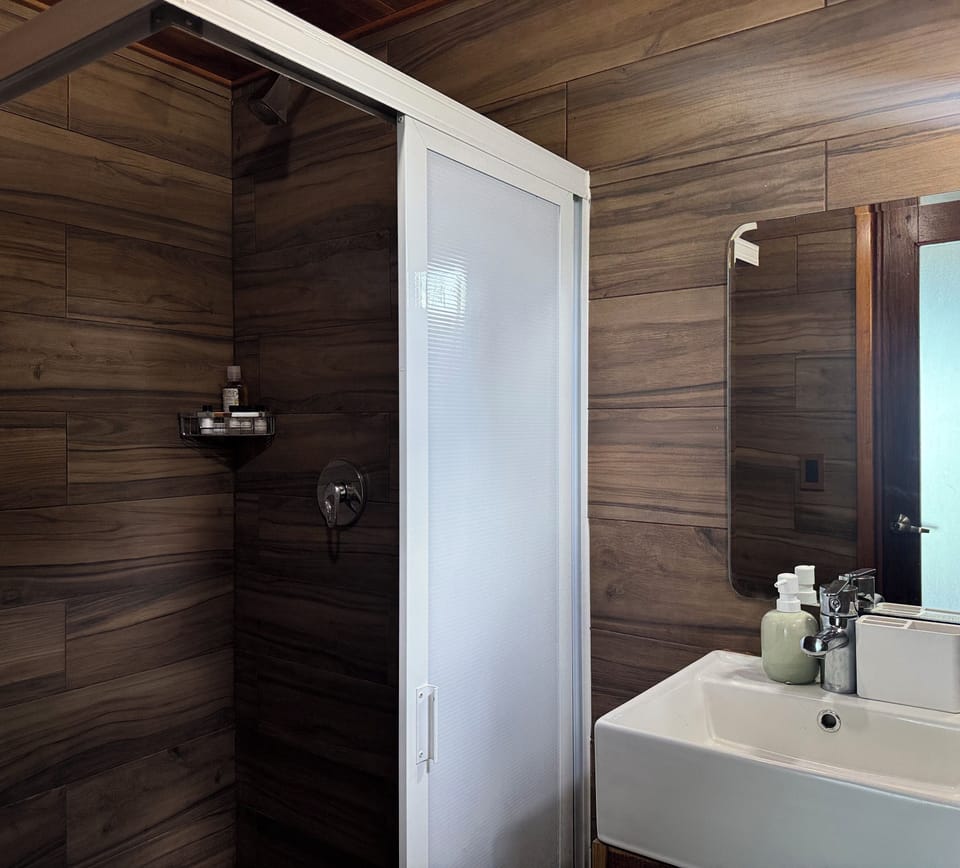 Luxury Suite, Lagoon View | Bathroom | Free toiletries, hair dryer, towels, soap
