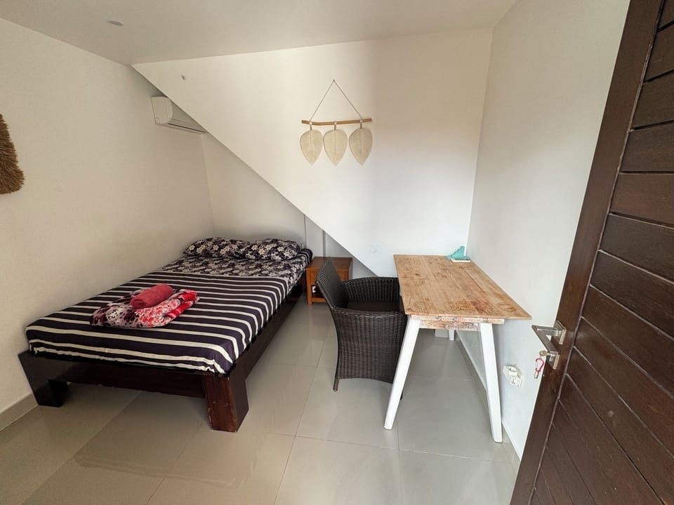 Room 5  Standard Double Room with Shared Bathroom | Free WiFi, bed sheets