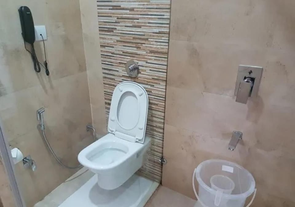 Shower, free toiletries, hair dryer, slippers