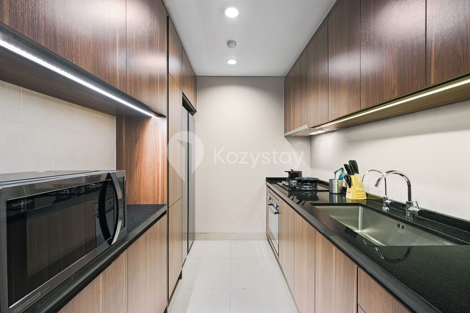 Apartment, 1 Bedroom, City View | Private kitchen | Full-size fridge, microwave, stovetop, cookware/dishes/utensils
