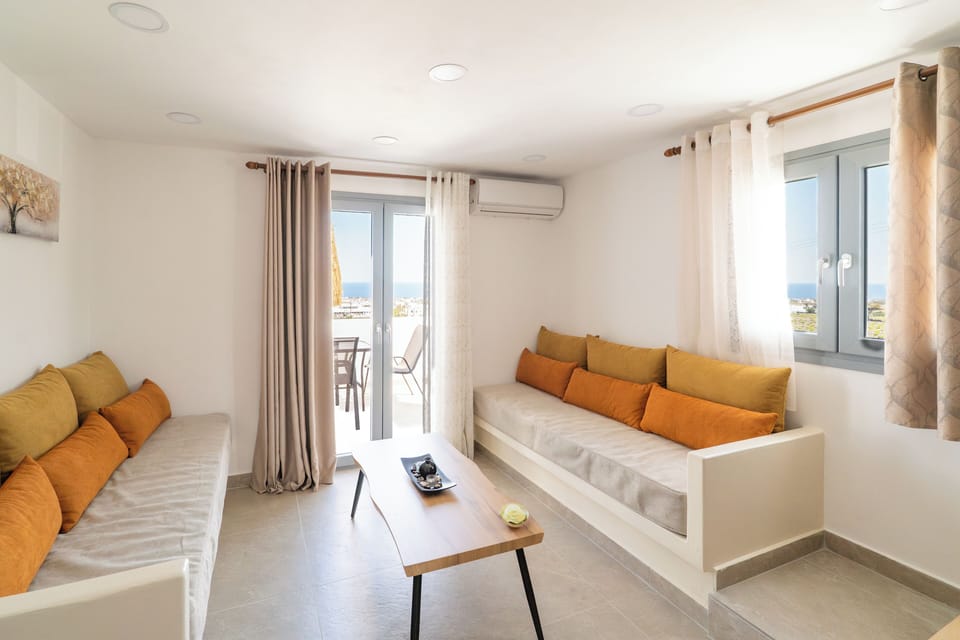 Loft Suite with Sea View | Living area | 32-inch Smart TV with satellite channels