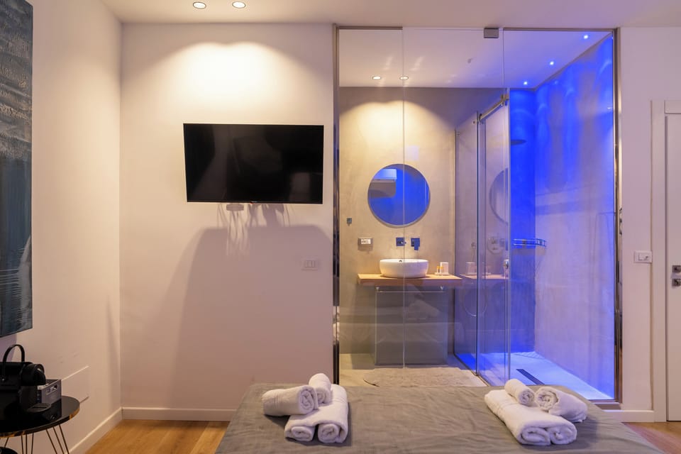 Luxury Townhome | Bathroom | Separate tub and shower, hair dryer, bathrobes, slippers